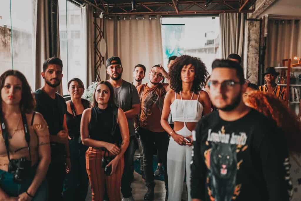 group of young individuals standing in a room