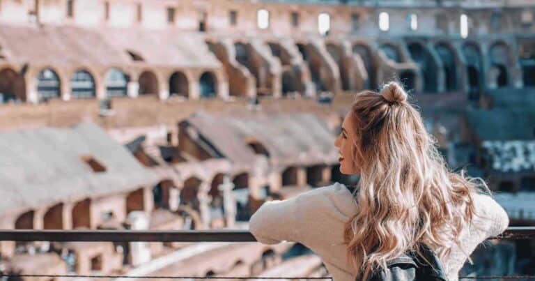 A girl smiling while looking at sightseeings