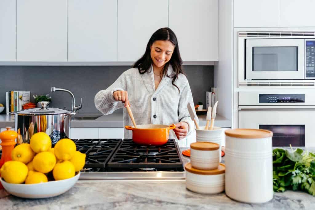 Women cooking in kitchen