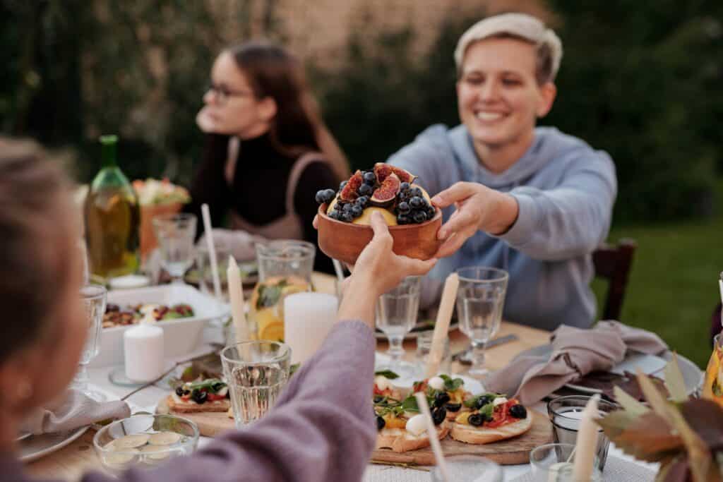 Shared outdoor meal between friends