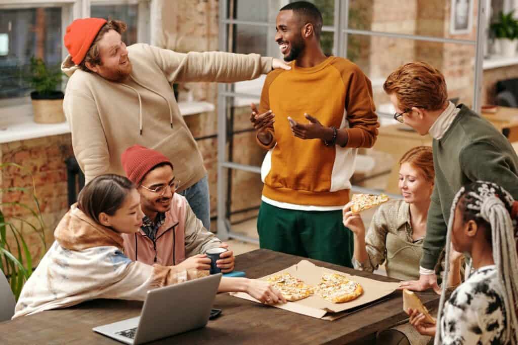 group of young individuals gathered at a table