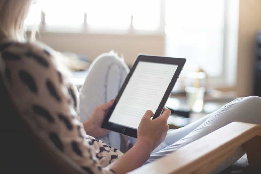 A girl reading an electronic book