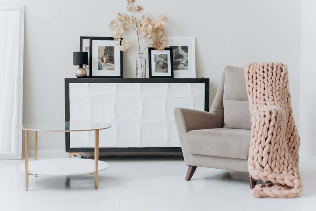 Cozy pastel living room with a blanket