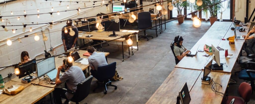 People working in a coworking or common study space.